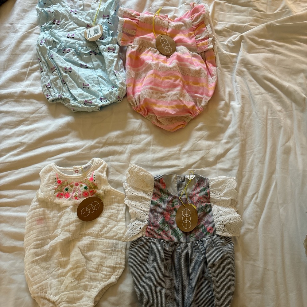 Set of Four Egg Rompers/Dresses.
